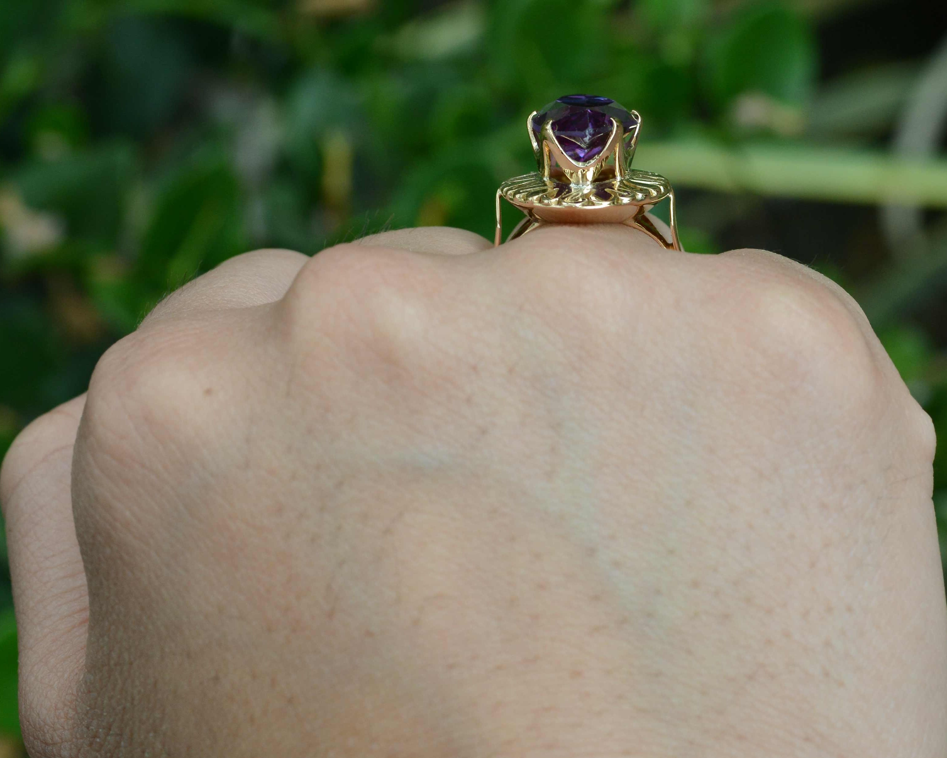 A 1940's, amethyst gold dome ring.
