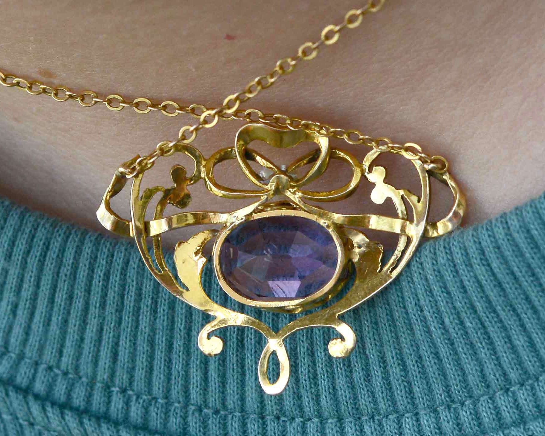 With scrolling, flowing vines, this is an authentic antique Art Nouveau amethyst necklace.