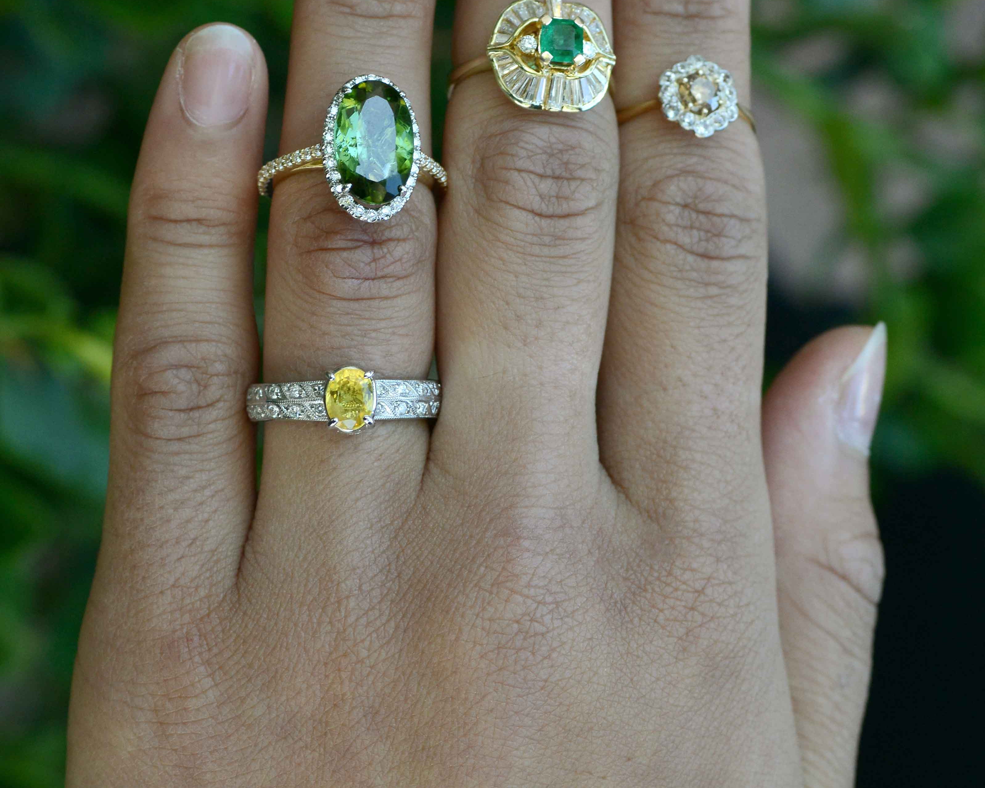 Vintage gemstone and diamond gold wedding rings.