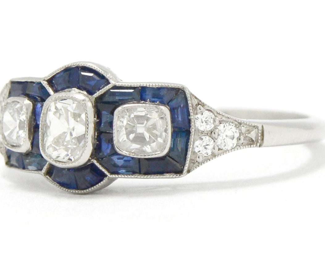Nearly 2 carats of blue sapphires and diamonds are in this art deco ring.