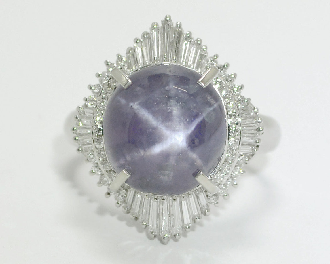 A size 11 purple star sapphire platinum statement ring.