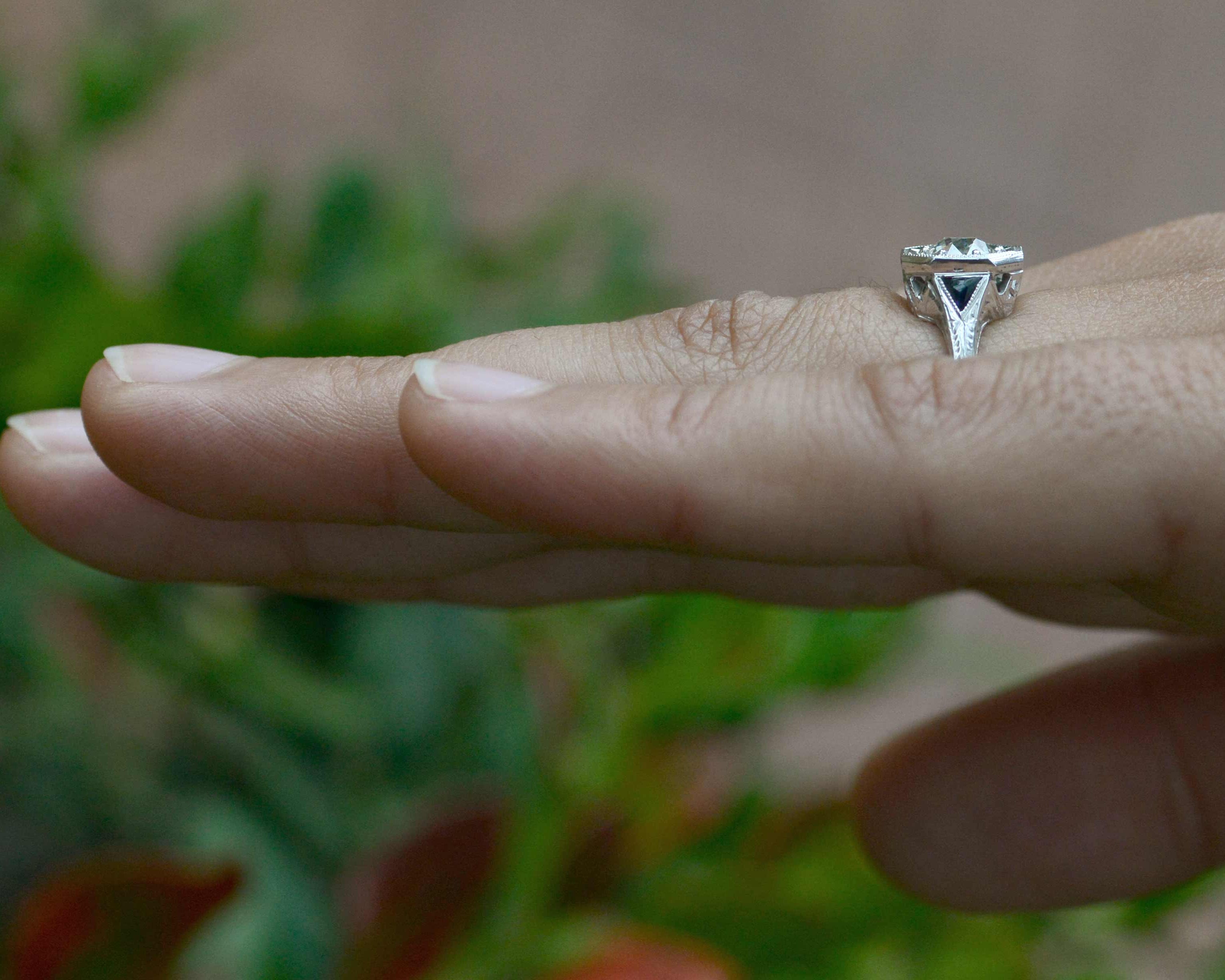 A three stone design Art Deco engagement ring.
