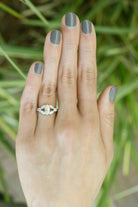 A 3/4 carat diamond engagement ring.