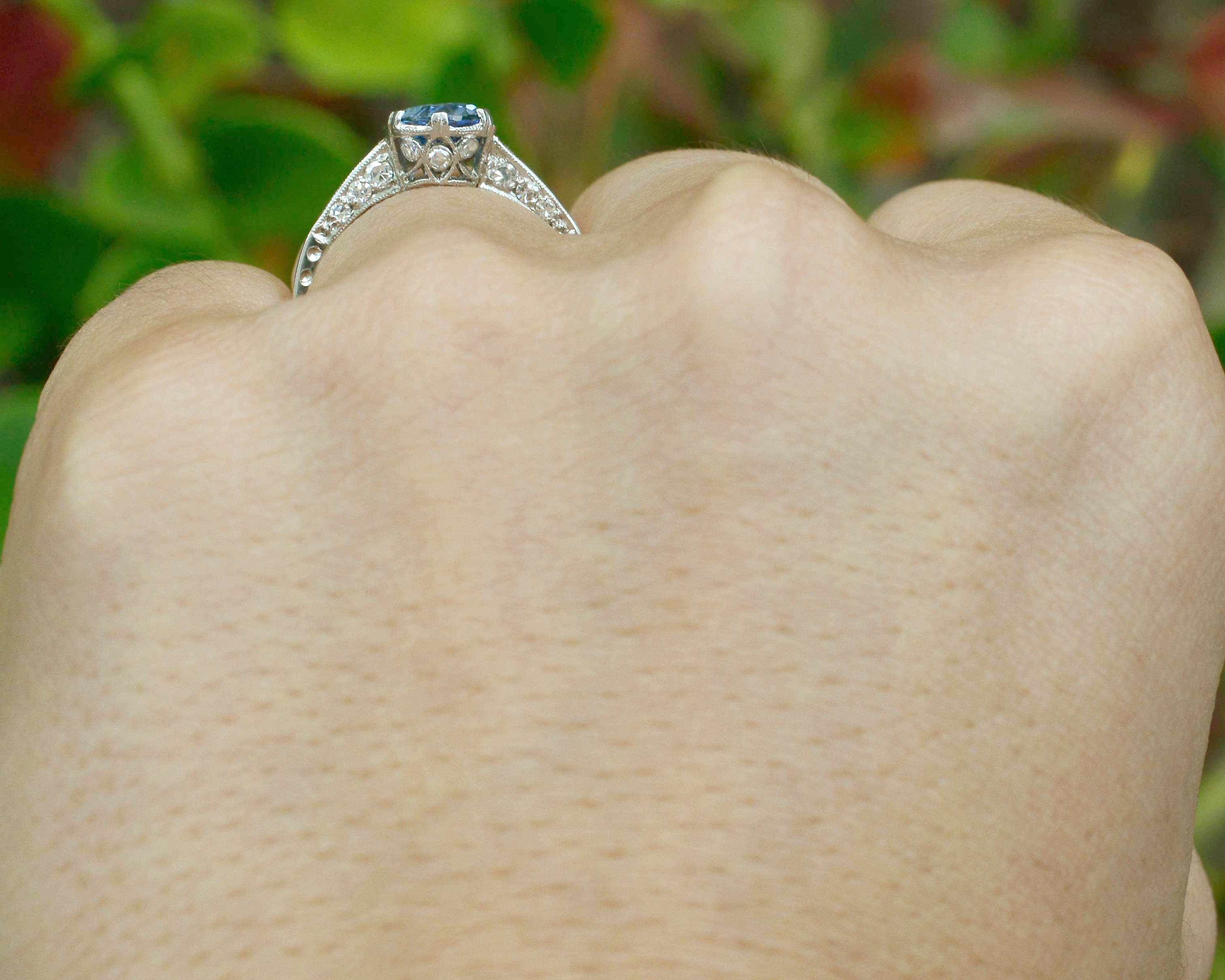 6 prongs support the blue ceylon sapphire platinum Art Deco solitaire engagement ring.