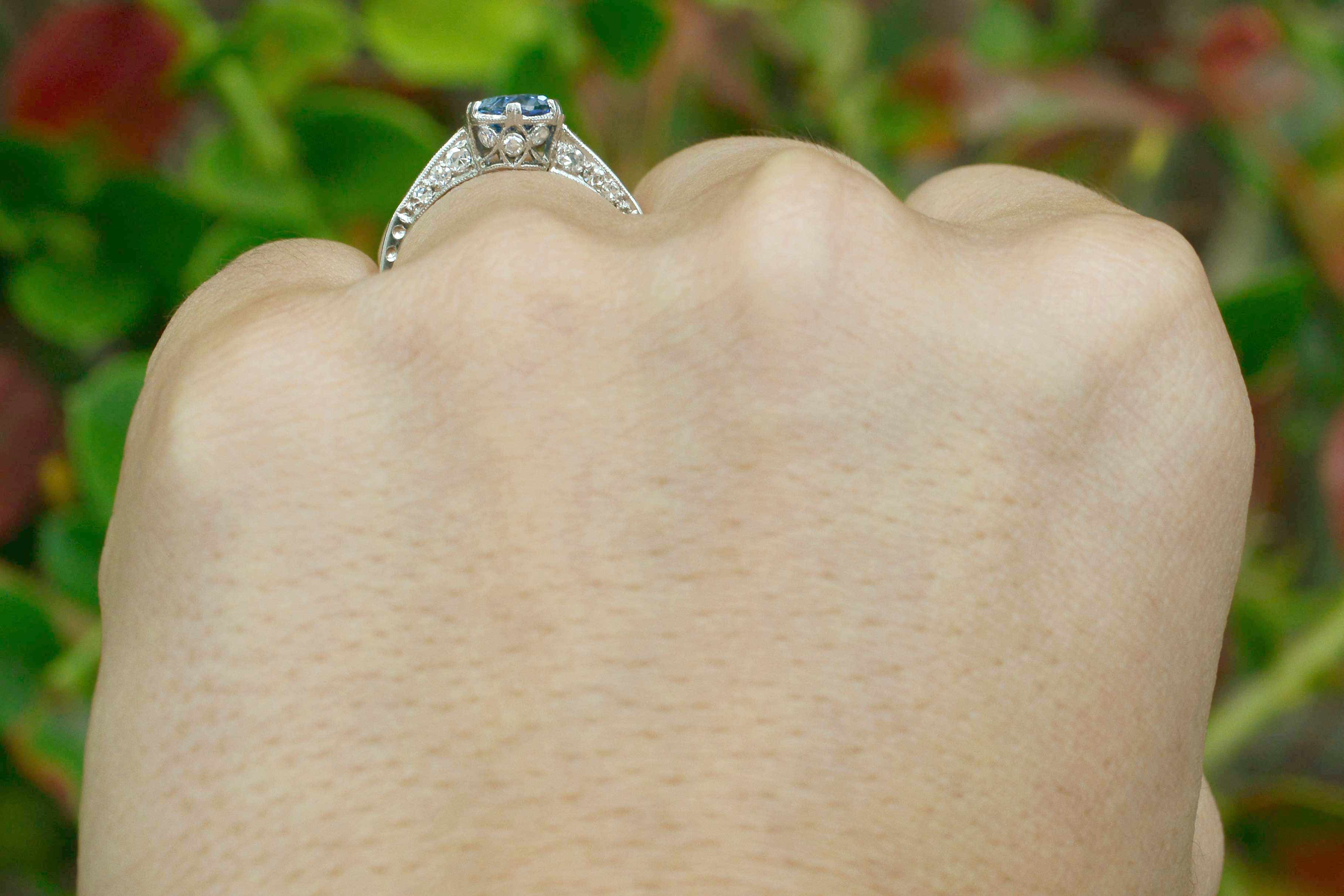 6 prongs support the blue ceylon sapphire platinum Art Deco solitaire engagement ring.