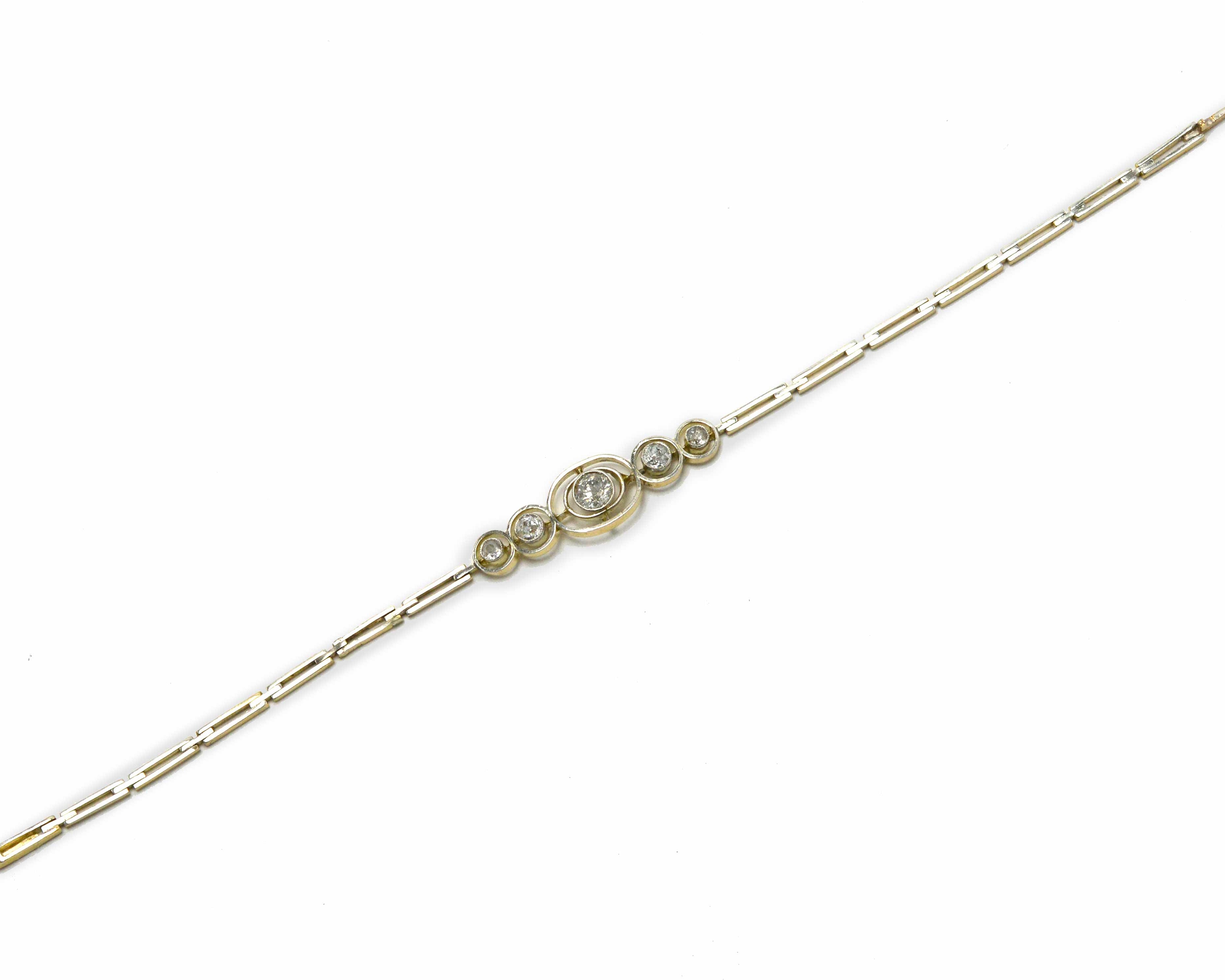 Concentric bezel settings of platinum 5 fiery hand-cut old mine diamonds are set in this bracelet.