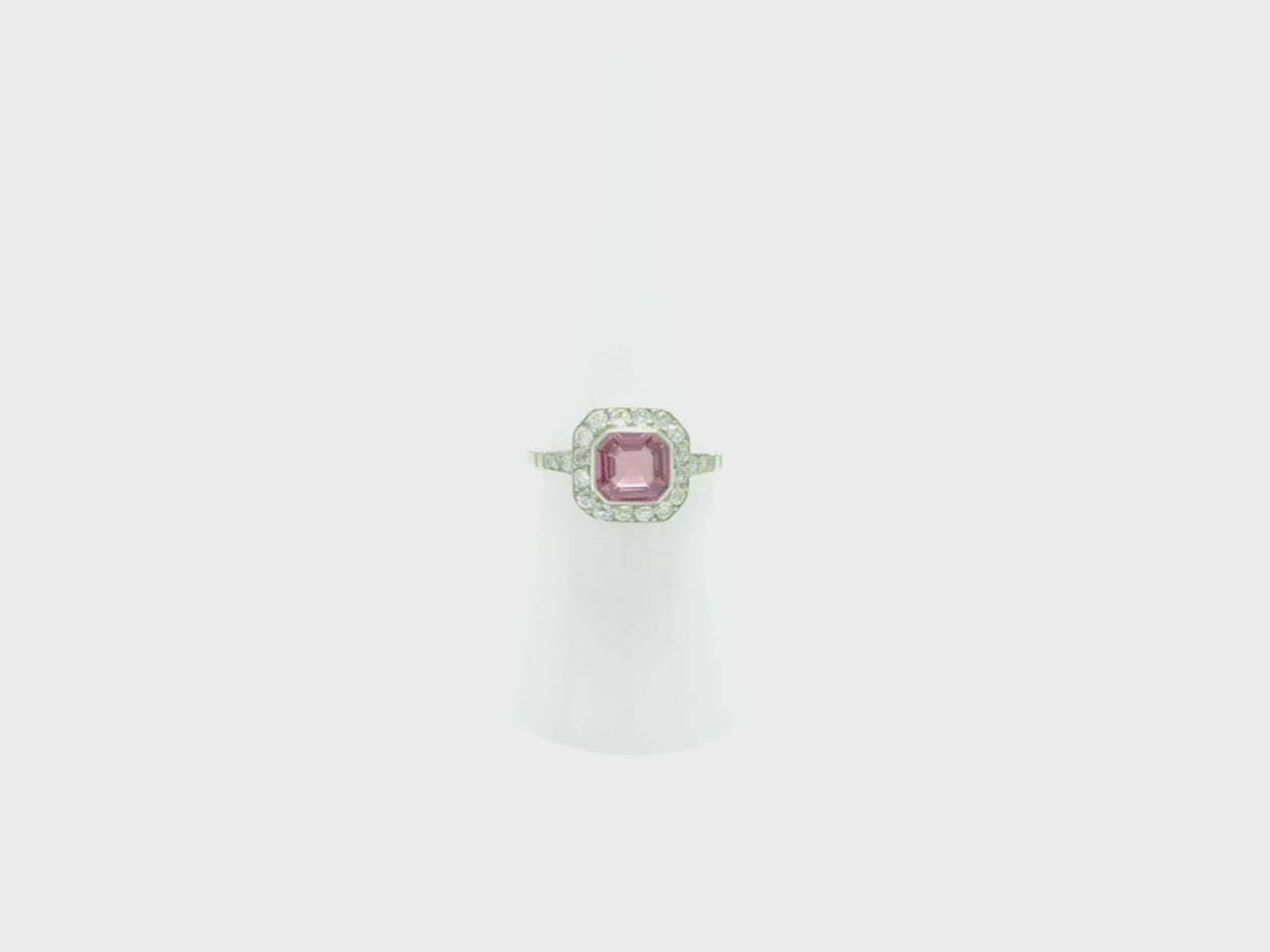 The halo of diamonds in this bridal ring display G - h color and vs clarity.