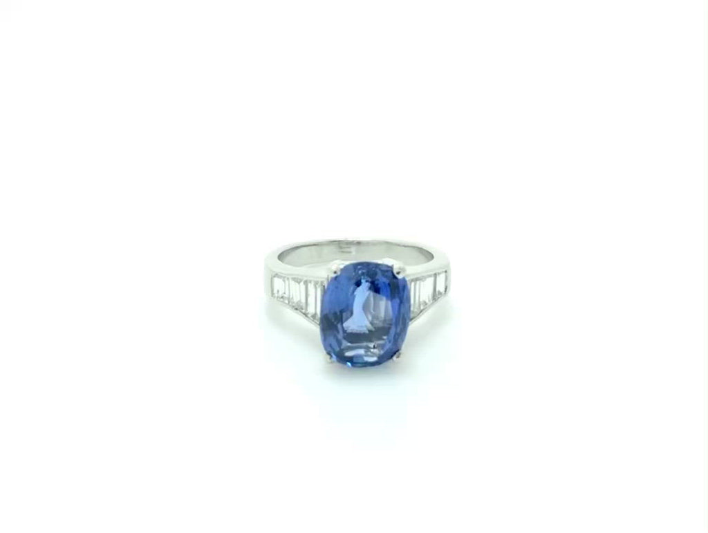 A natural, unheated oval ceylon sapphire engagement ring.