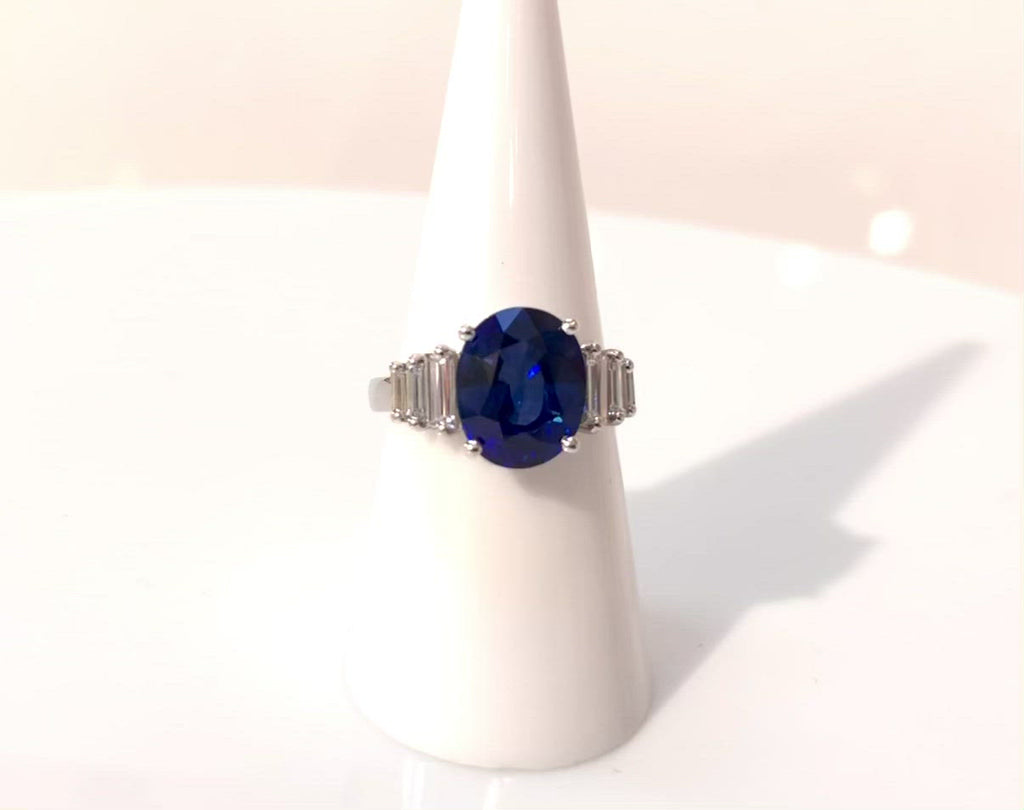 A new, Art Deco revival wedding ring set with a 4 carat oval sapphire.