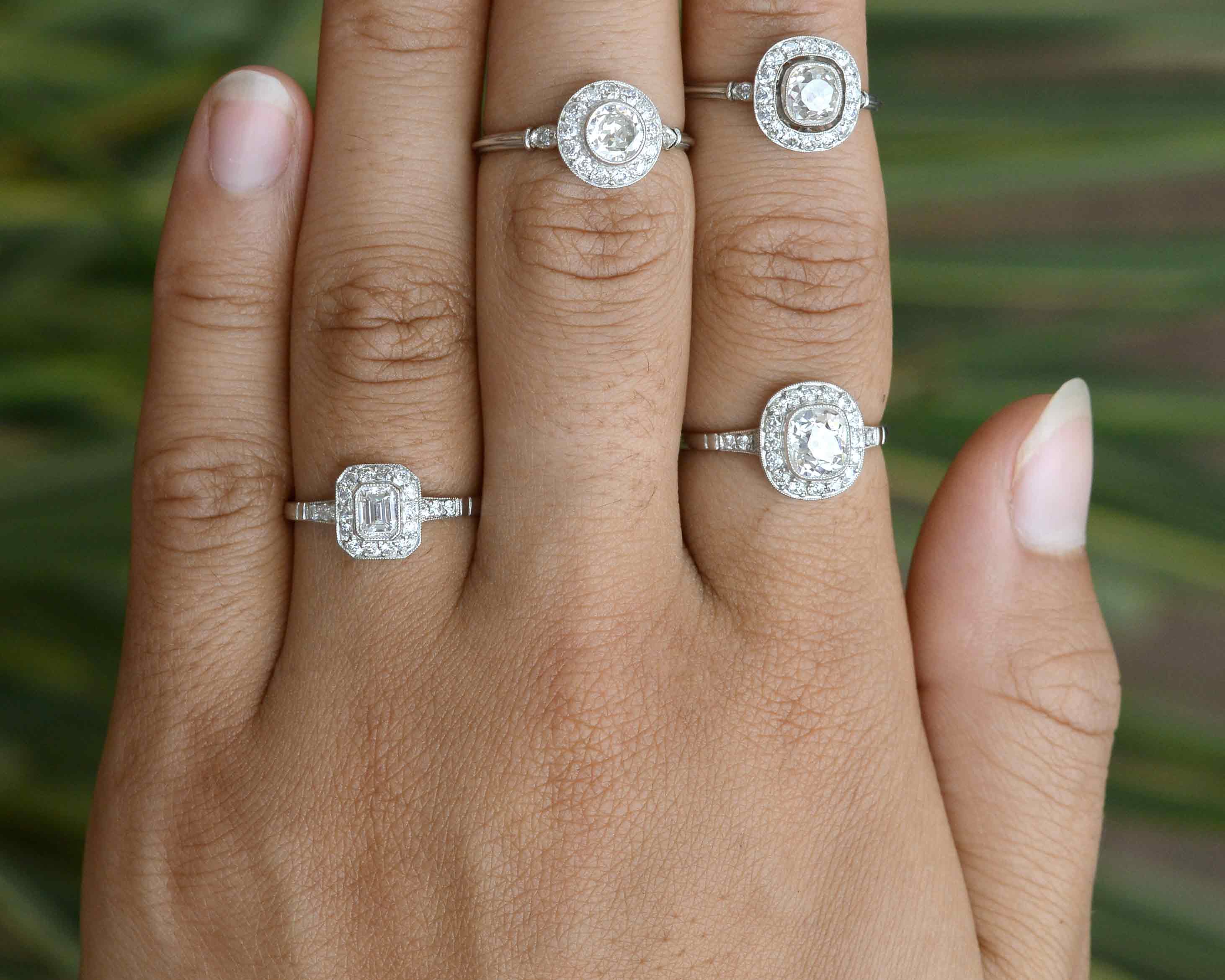 A collection of unique Art Deco style and antique engagement rings.