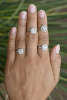 A collection of unique Art Deco style and antique engagement rings.