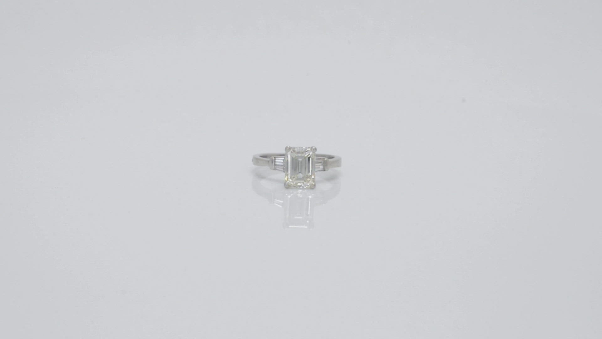 This platinum diamonds solitaire bridal ring is from the 1920's Art Deco era.