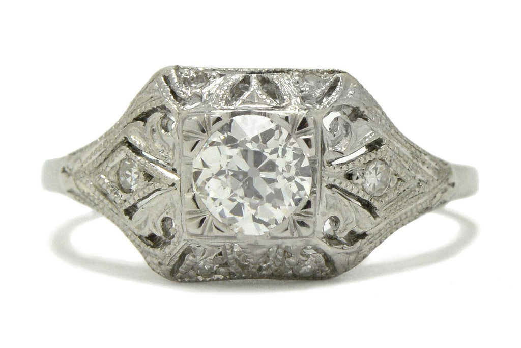 Half carat diamond heirloom platinum engagement ring.