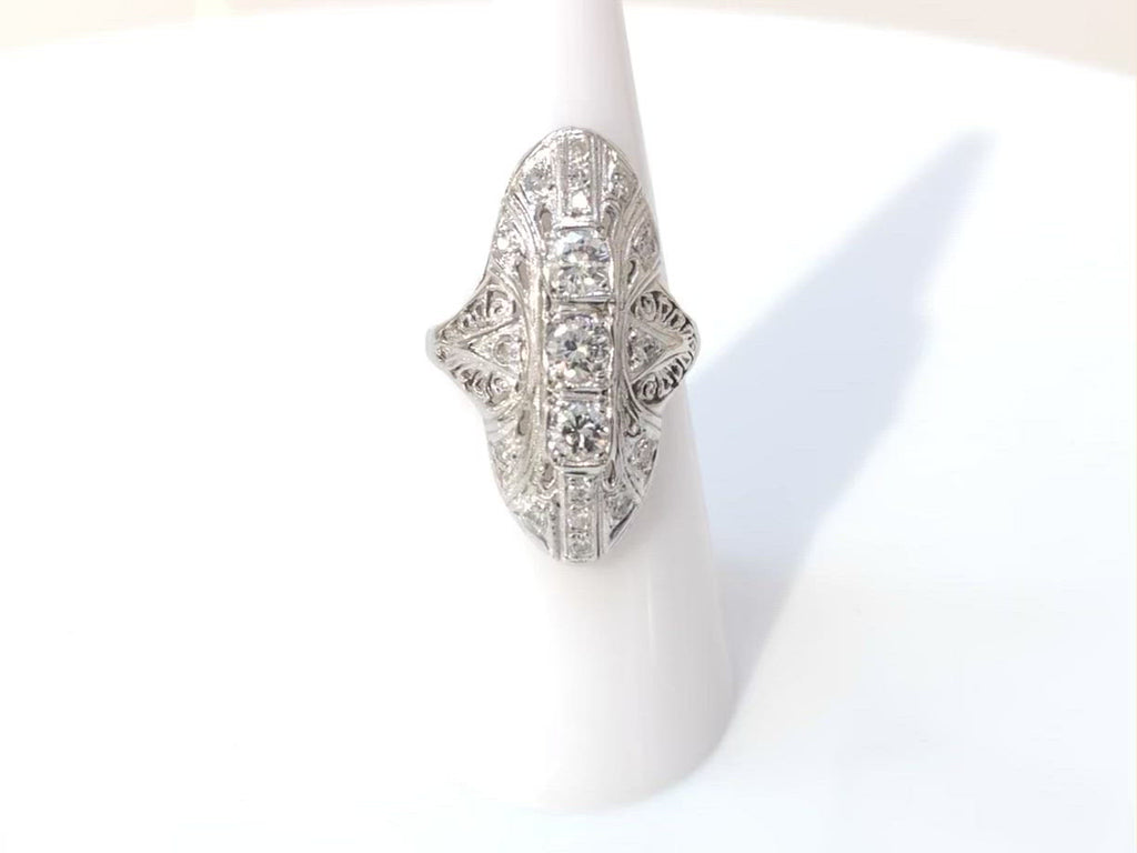 Long oval navette diamond white gold ring.