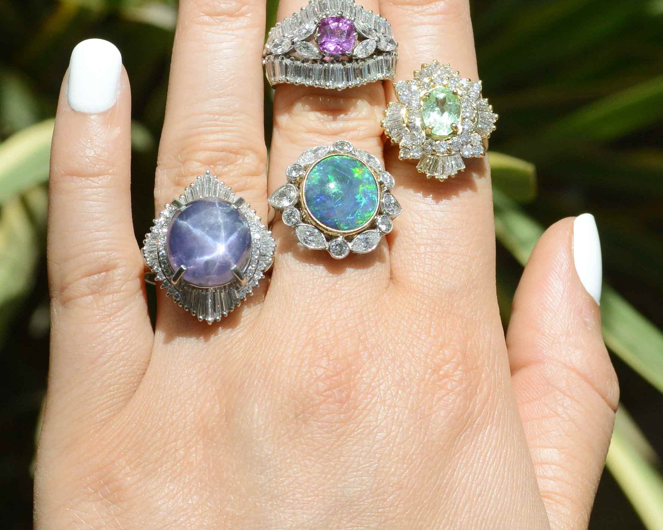 Some large gemstone and diamond cocktail rings available from our estate jewelry store.