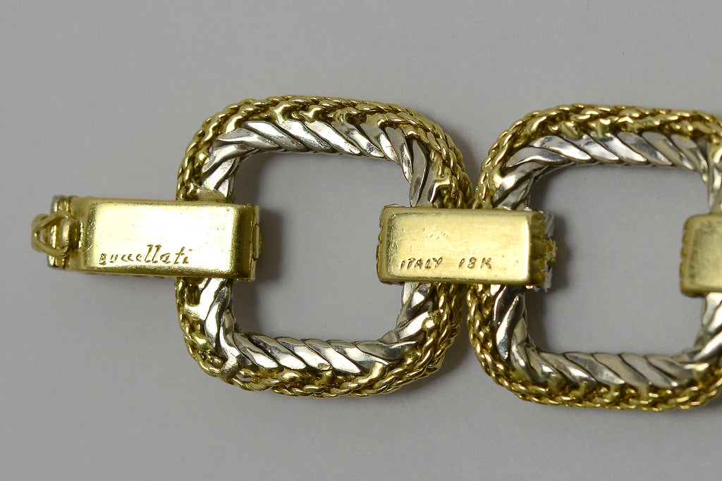 A buccellati Italy 18k hallmark engraved on a gold bracelet.