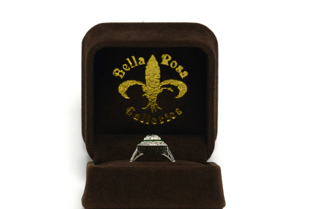 An Art Deco revival engagement ring displayed in our presentation box.