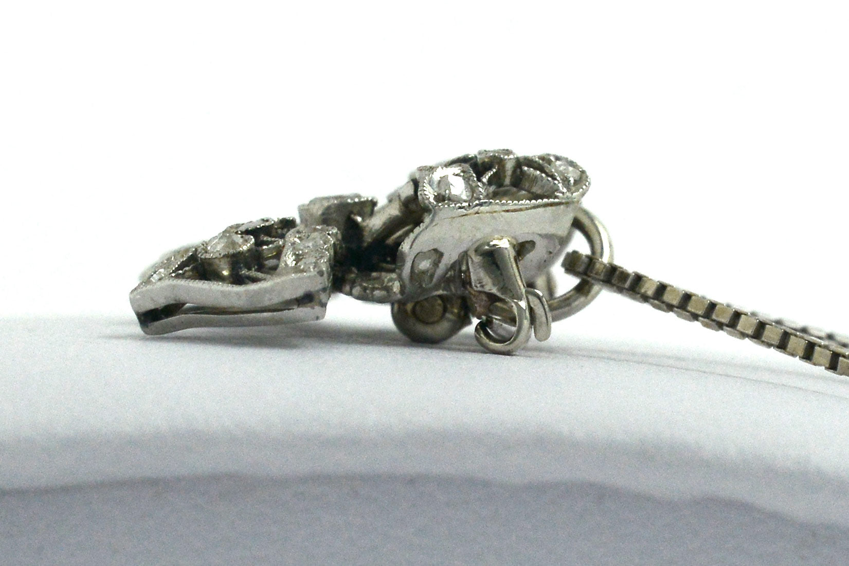 18" box chain necklace an Edwardian diamond pendant.