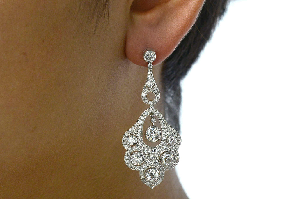 6 carats of diamonds drop dangle earrings.
