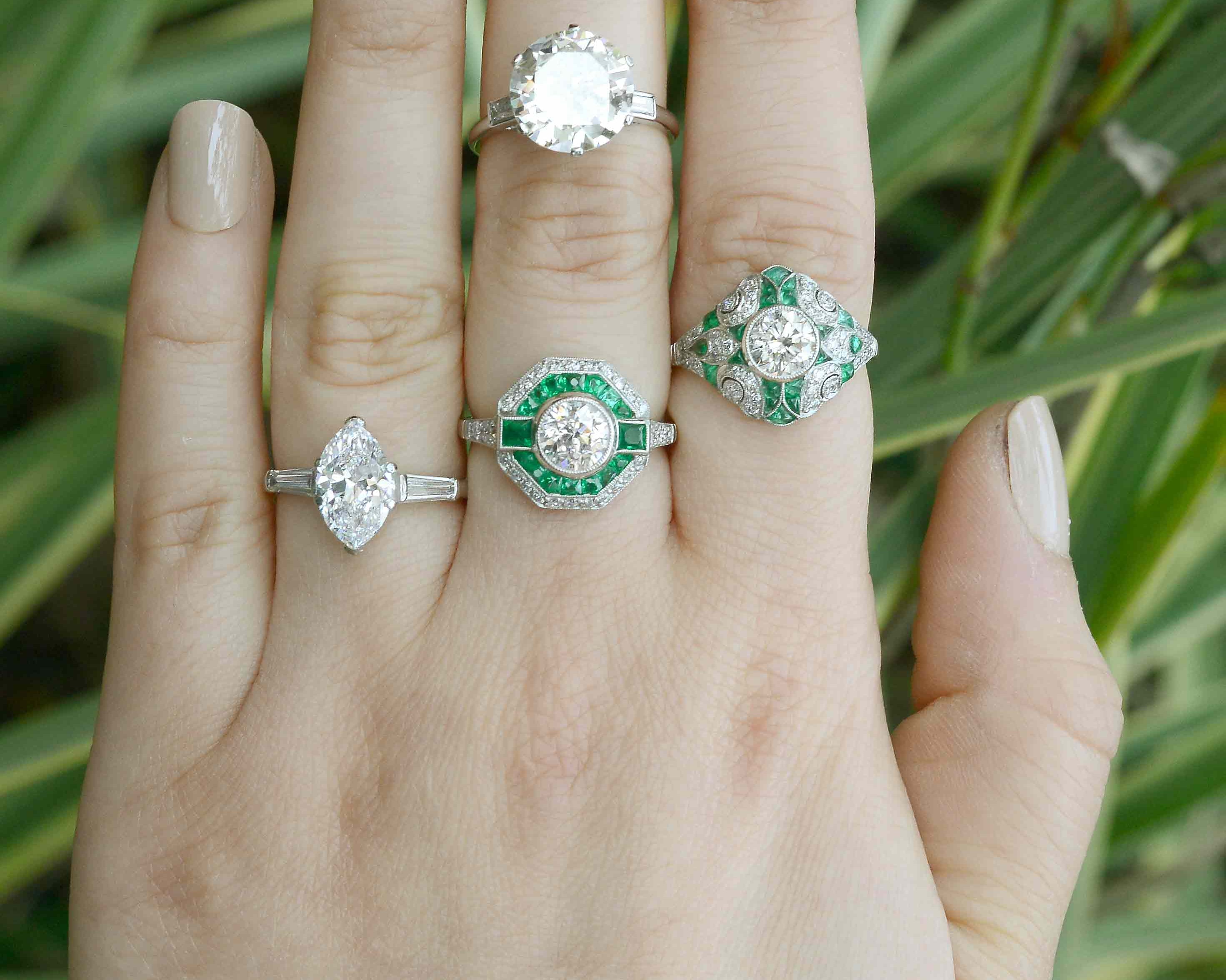 Some diamond and emerald engagment rings available from our gallery.