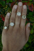 A selection of our floral diamond cluster engagement rings.