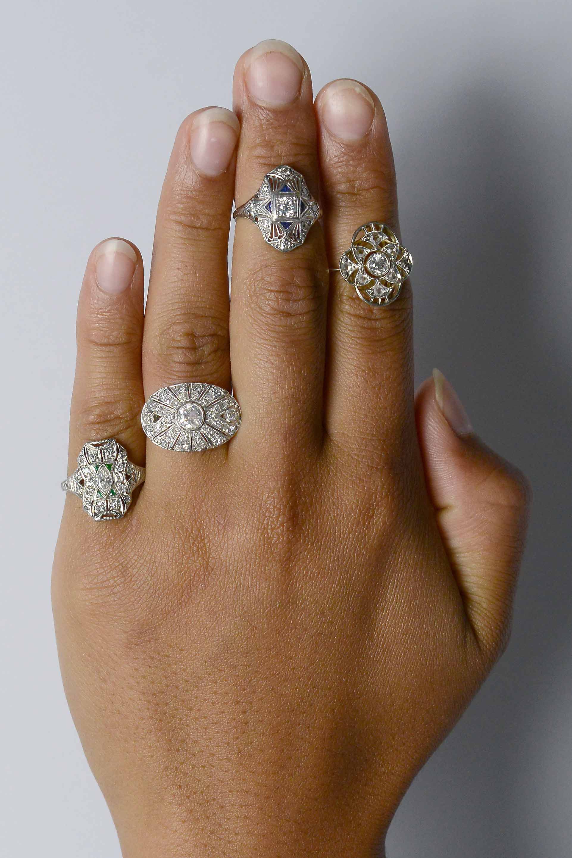 Diamond and platinum antique statement rings.