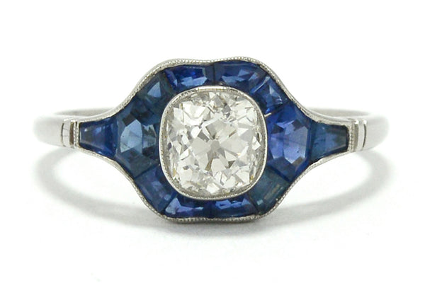 A unique, newly made antique cushion diamond engagement ring.