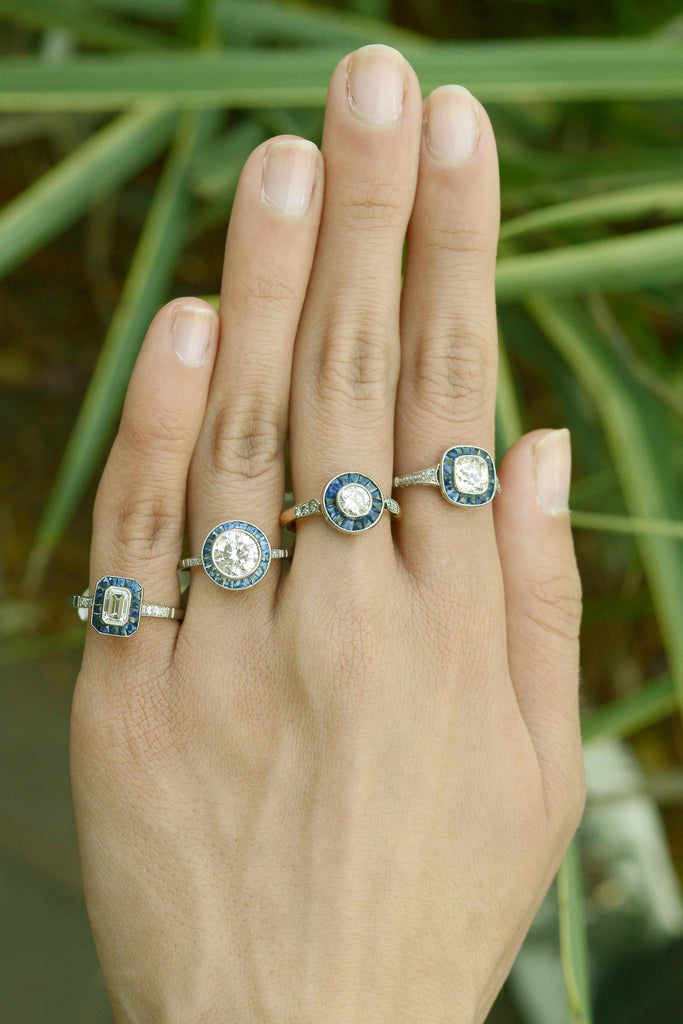 Old diamond and blue sapphire engagement rings.