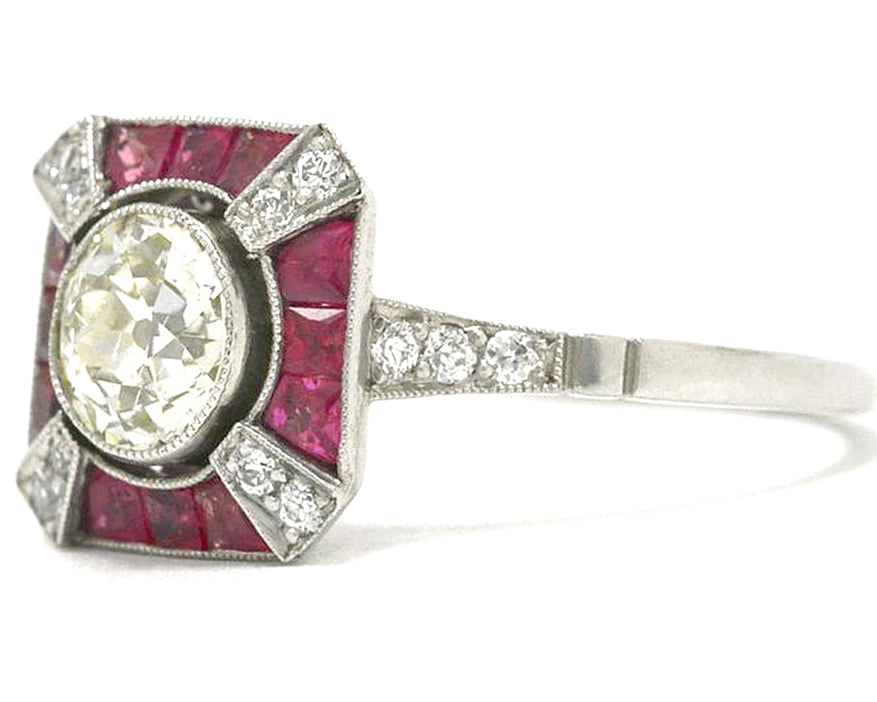 An Art Deco inspired diamonds and rubies x design engagement ring.