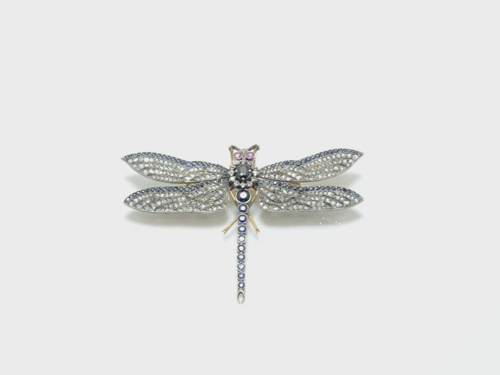 This natural diamond and sapphire insect brooch pin shows great sparkle.
