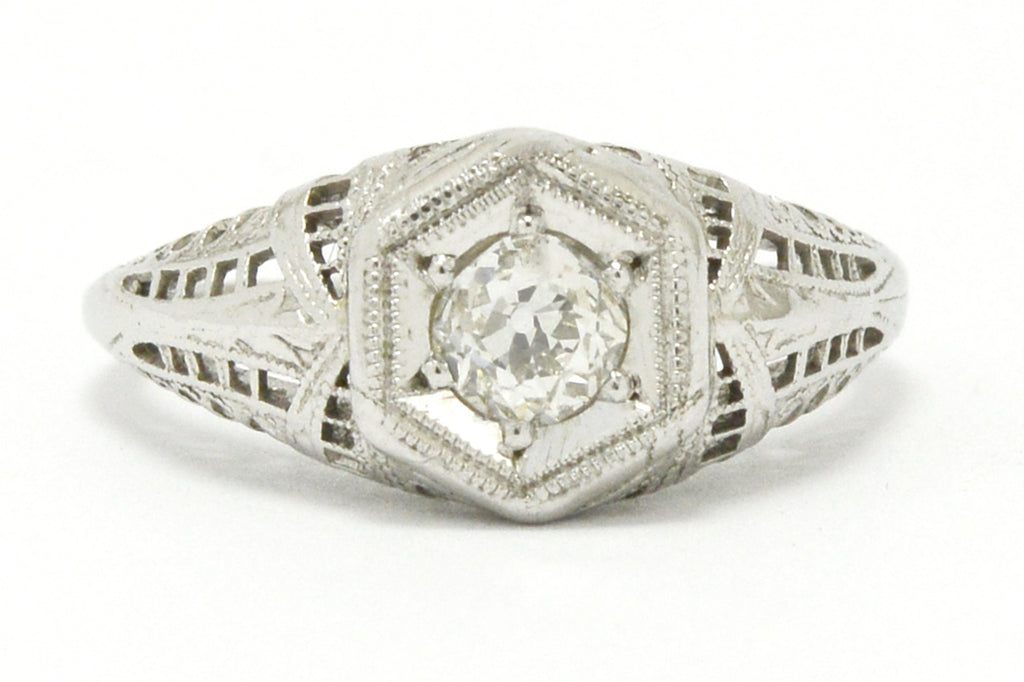 Diamond hexagon filigree 18k white gold engagement ring.