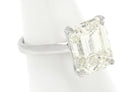 An 8 carat emerald cut diamond in a platinum setting.