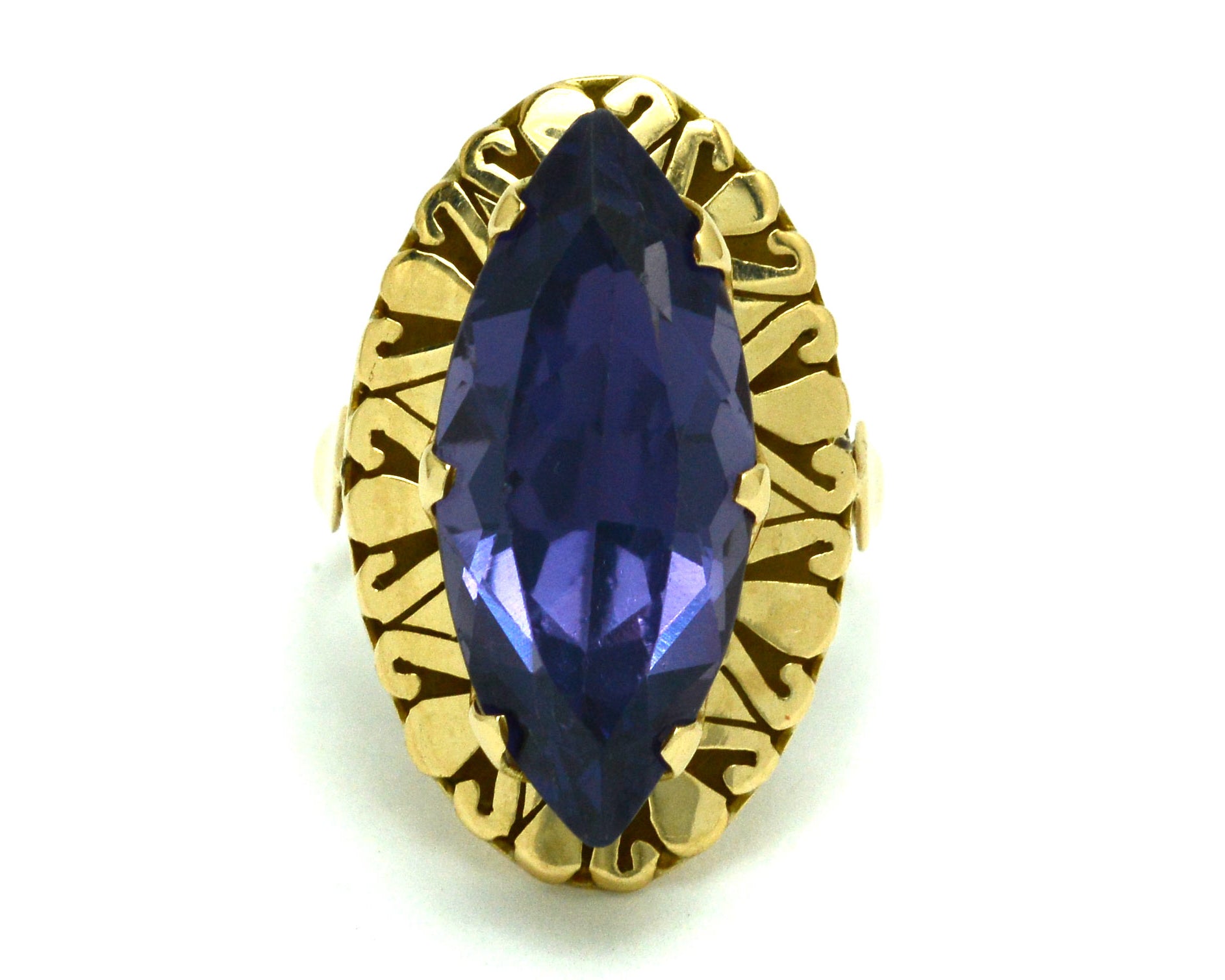 A marquise cut amethyst in a retro 14k gold ring setting.