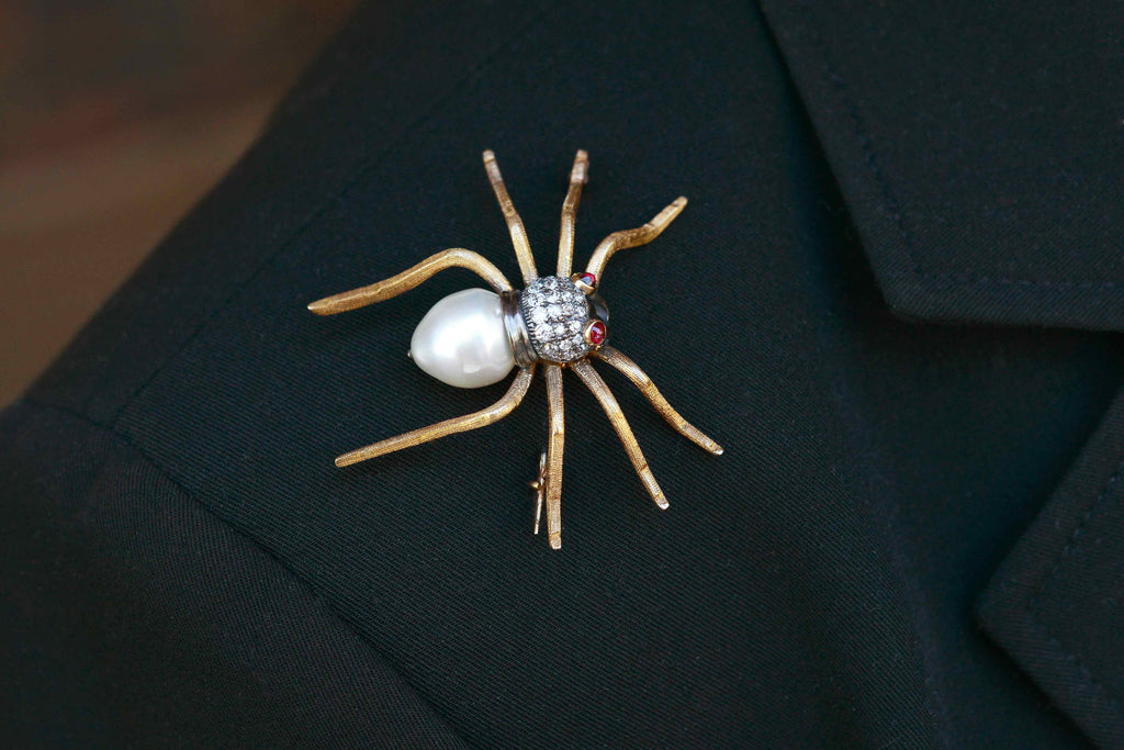 A giant diamonds and pearl tarantula pin.