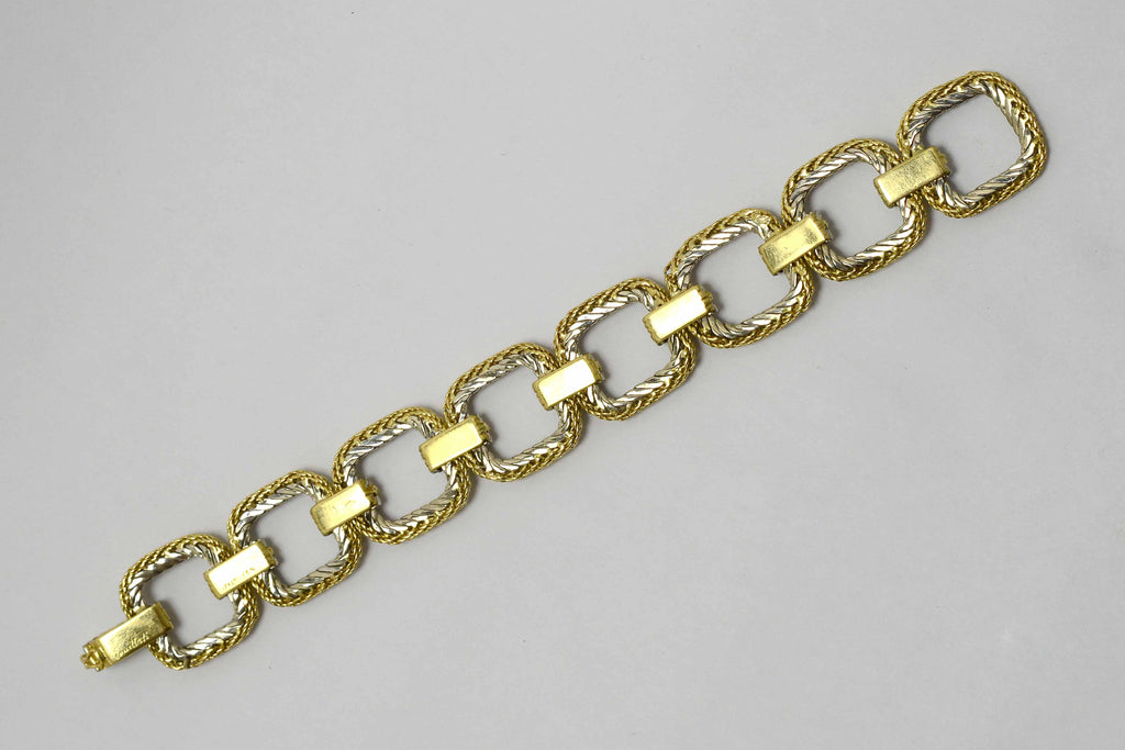 A 1980s estate gold woven link bracelet.
