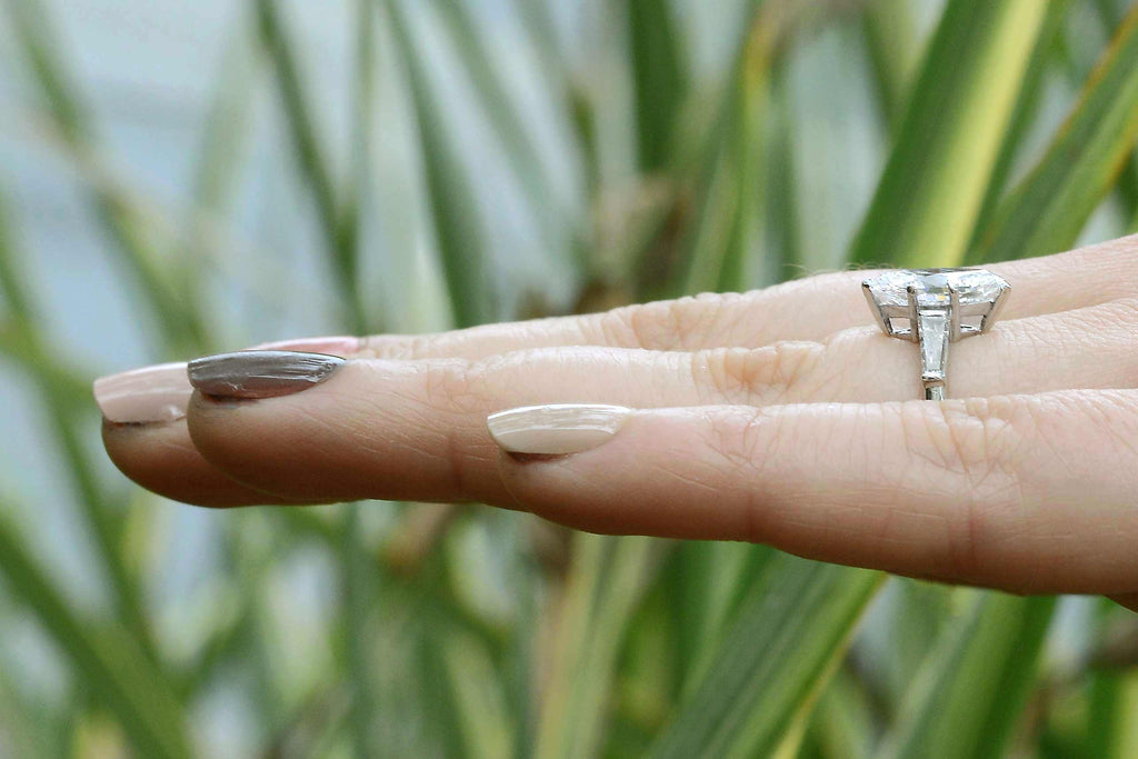 A unique antique 3 diamond wedding ring.