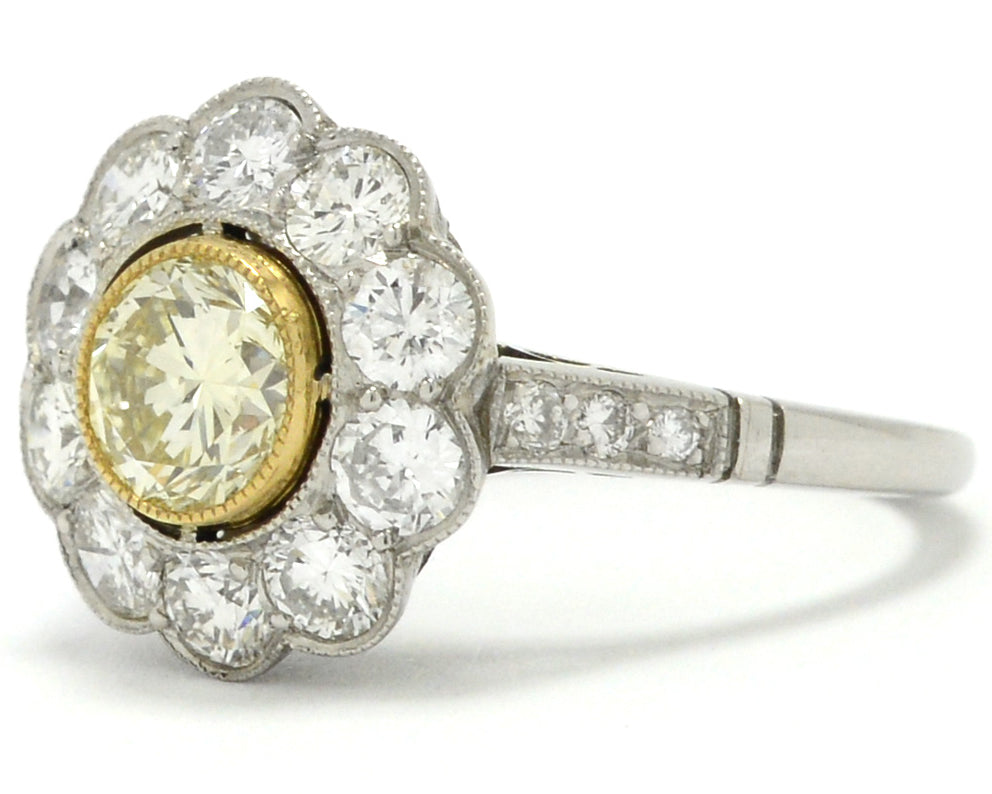 A bezel set round brilliant diamond platinum, Art Deco style engagement ring.