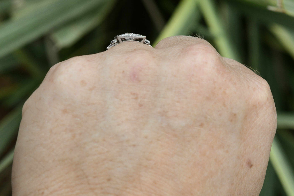 A tiered shank diamonds enamel wedding ring.