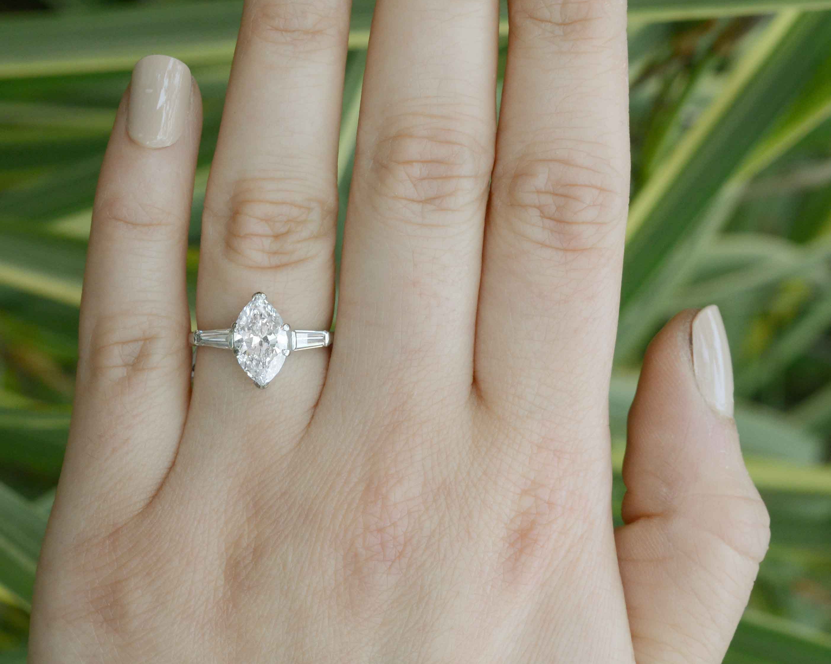 A good proportion, unique 2 carat marquise diamond engagement ring.