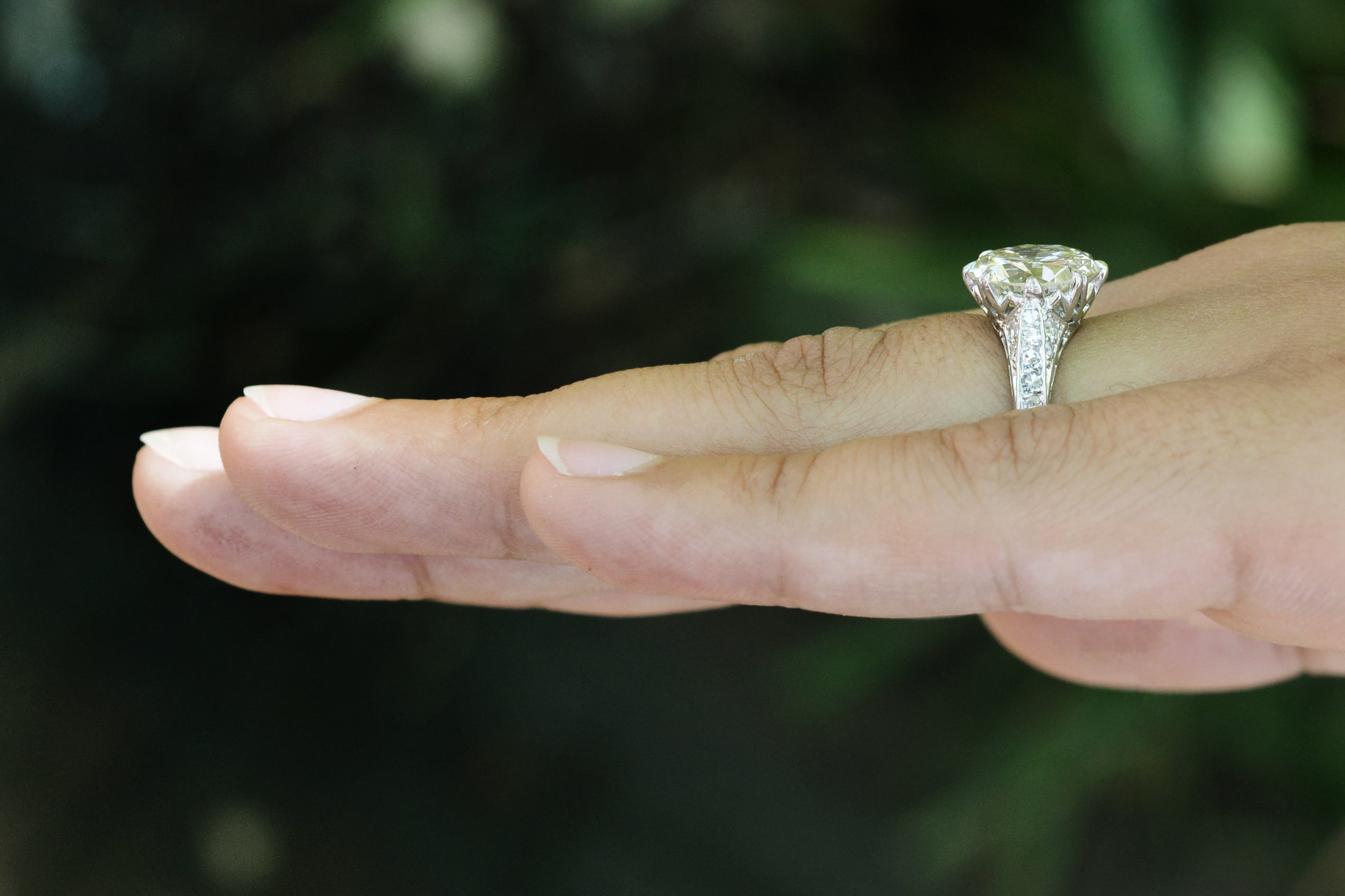 Edwardian four carat diamond solitaire wedding ring.