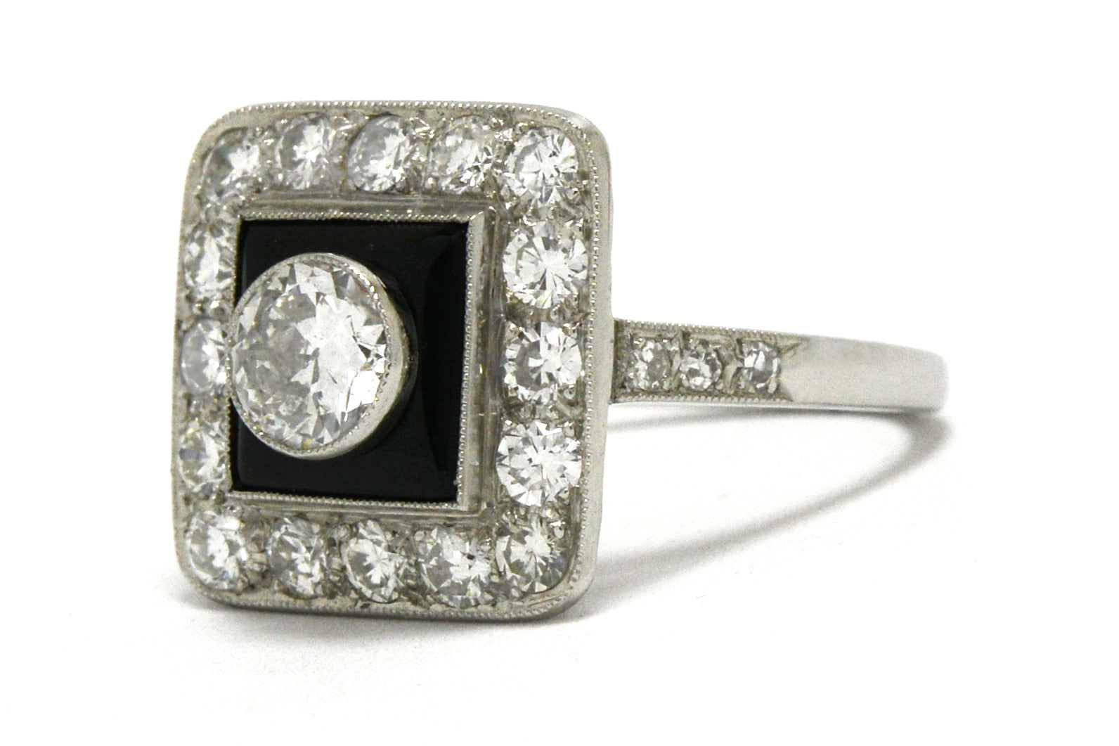 An onyx and diamond target Art Deco ring.
