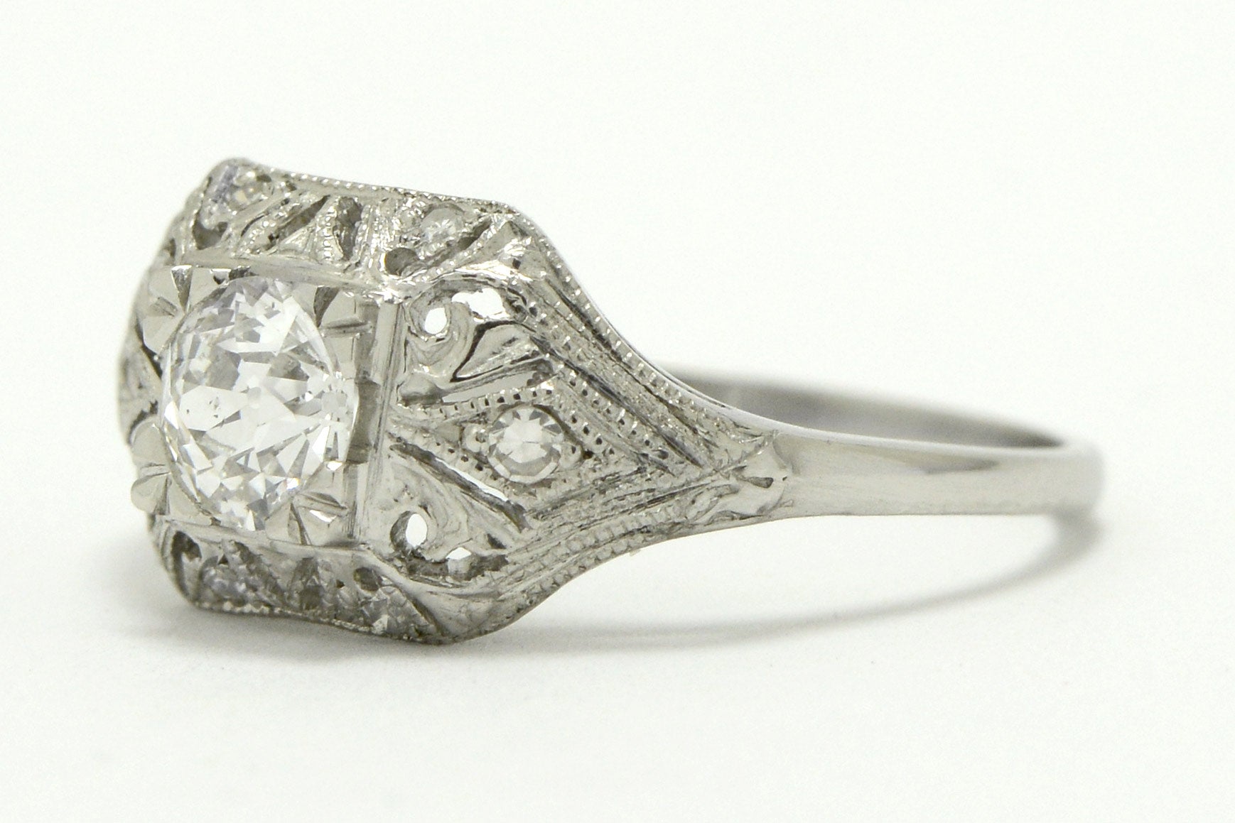 Rounded rectangle diamonds wedding ring.