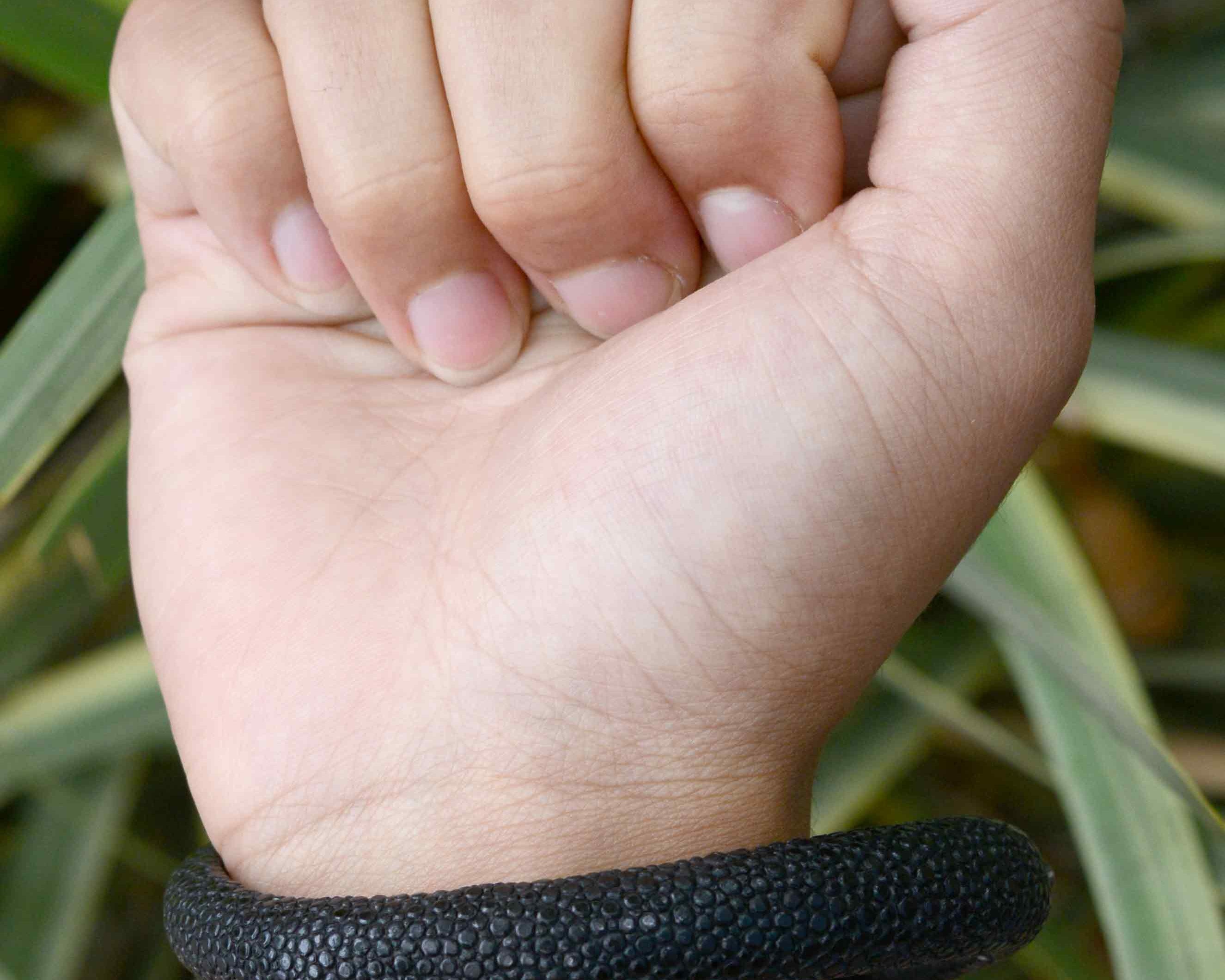 Black stingray leather lines the bottom of this new dragon bracelet.