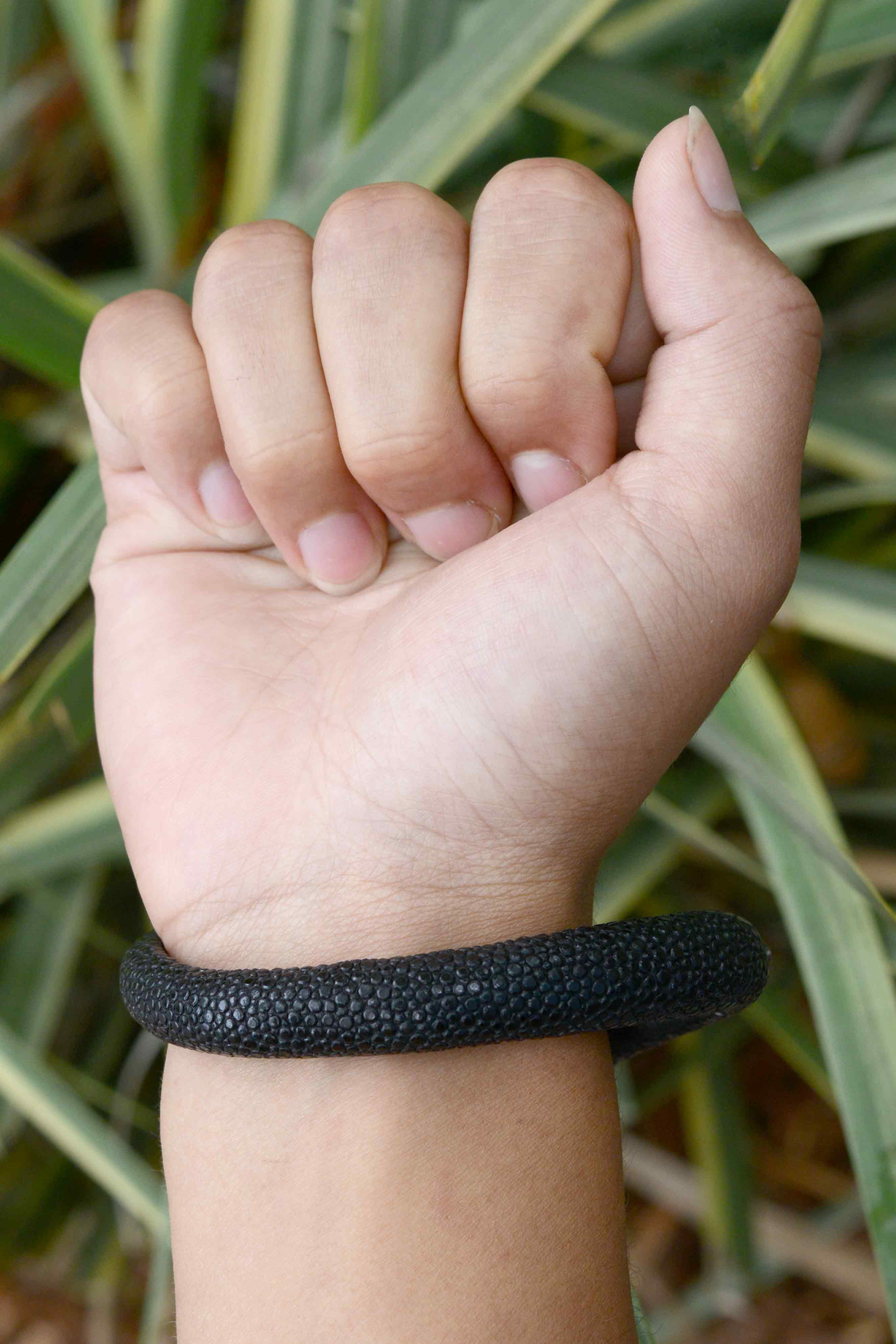 Black stingray leather lines the bottom of this new dragon bracelet.