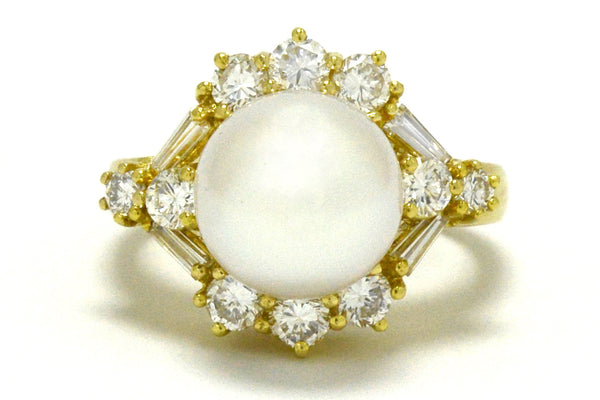 A modern, estate south sea pearl and diamonds cocktail ring.