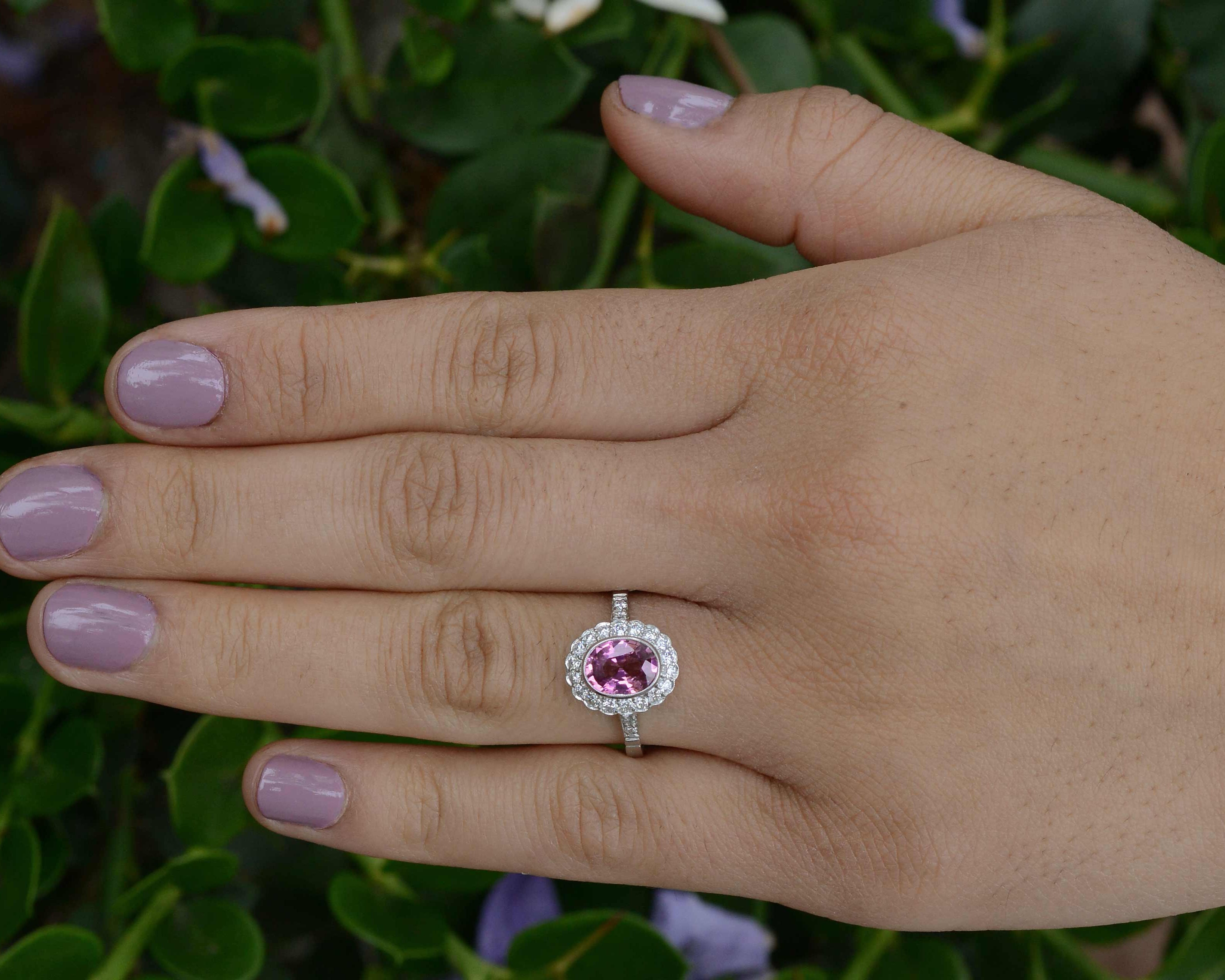 A natural pink 1.50 carat oval pink sapphire wedding ring.