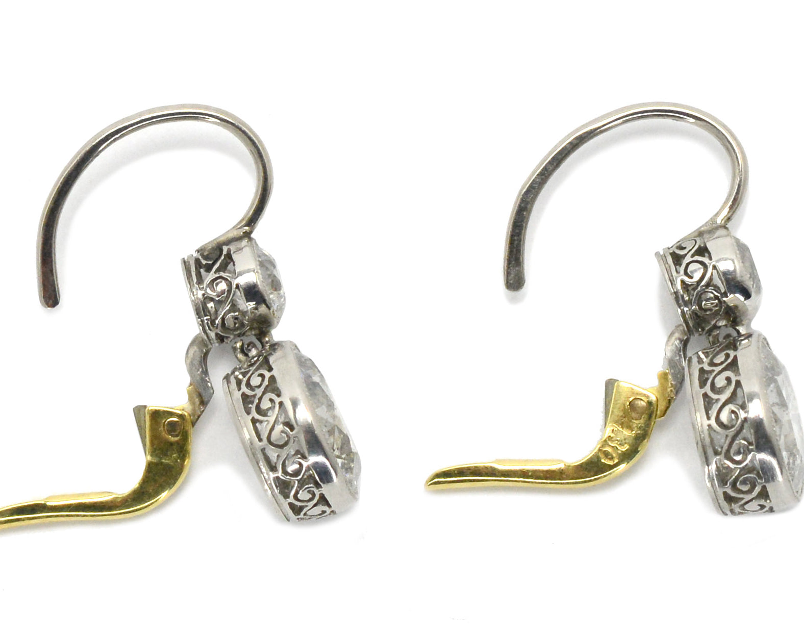 Two tone Edwardian revival earrings crafted of both platinum and yellow gold.