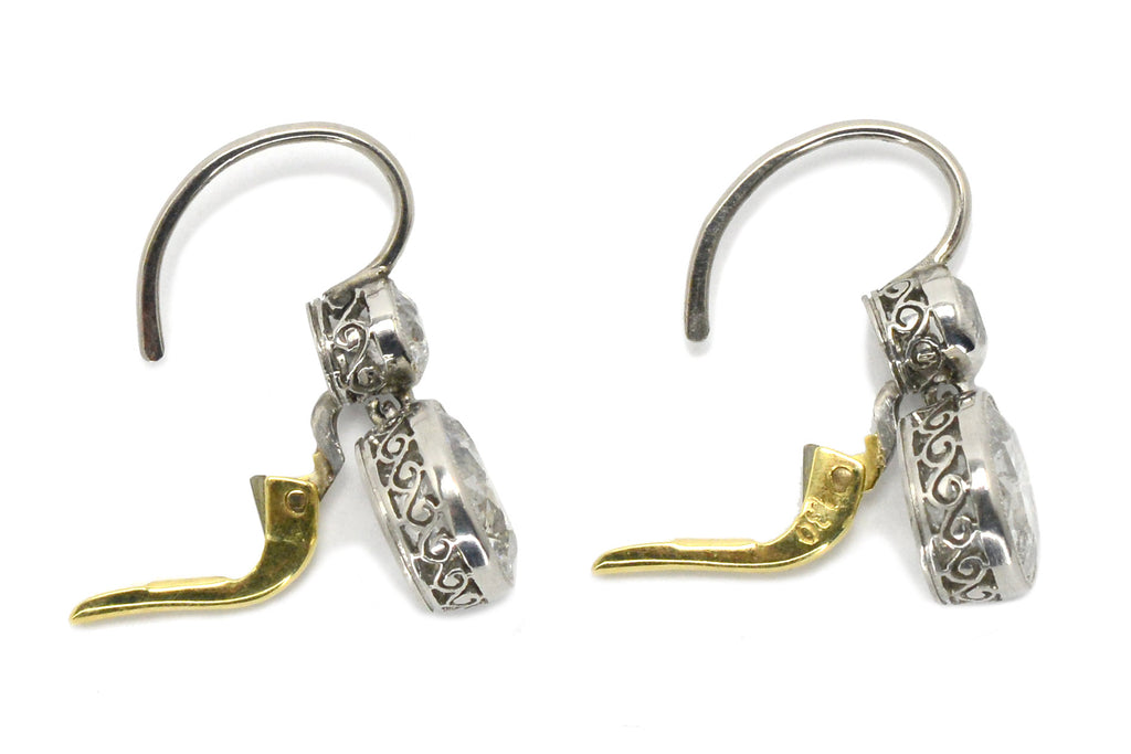 Two tone Edwardian revival earrings crafted of both platinum and yellow gold.