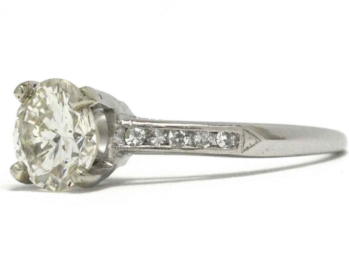 A size 6 1/2 platinum diamond solitaire wedding ring.