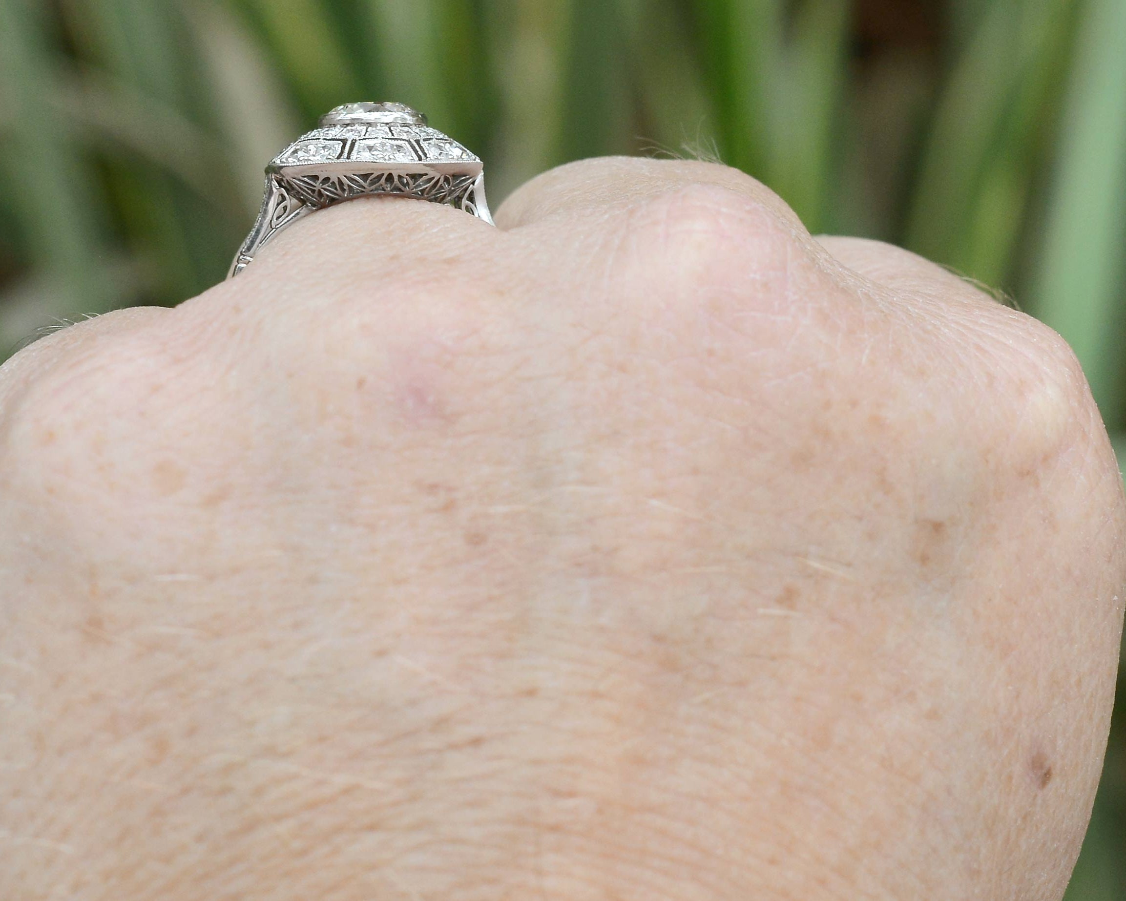 Over 1 carat diamonds cluster ring.